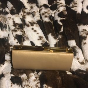 Caché tan clutch crossbody